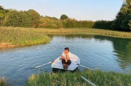 Rowing dinghy in solitude