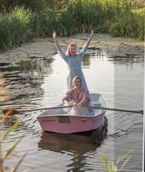 Standing up in a rowing boat