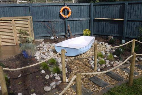 pastel blue full-size boat planter